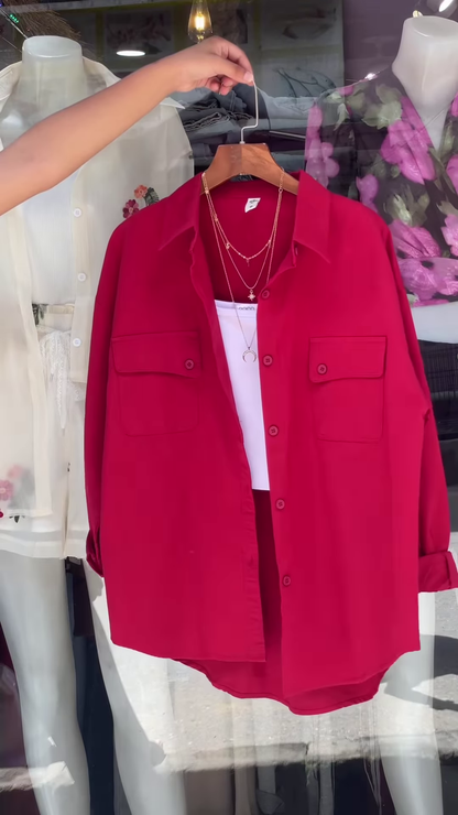 White Embroidered Shirt with Layered Styling – Boutique Elegance in a Window Display