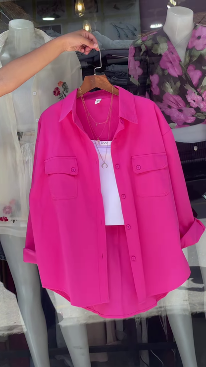 White Embroidered Shirt with Layered Styling – Boutique Elegance in a Window Display